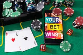 Mobile phone showing slotsph apk wins dashboard for Filipino players